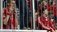 Tatapan kosong salah satu fans Bayern Munich usai melihat timnya dipermalukan Real Madrid 0-4 di Allianz Arena, (30/4/2014). (REUTERS/Michaela Rehle)