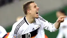 Germany's striker Lukas Podolski celebrates after scoring the 4-0 against Liechtenstein during their World Cup 2010 qualifying match on March 28, 2009 in Leipzig, eastern Germany. AFP PHOTO/OLIVER LANG