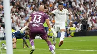 Real Madrid meraih kemenangan 2-0 atas Espanyol pada laga pekan kelima La Liga di Santiago Bernabeu, Sabtu (20/9/2025) malam WIB. Satu di antara gol Madrid dicetak Kylian Mbappe. (AP Photo/Manu Fernandez)