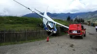 Tidak ada korban jiwa dalam insiden pesawat terobos pagar pembatas Bandara Ilaga, Papua, itu. (Liputan6.com/Katharina Janur)