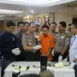 Sudirman, pelaku penembakan Italia Chandra Kirana Putri saat digelandang di Mapolda Metro Jaya. (Liputan6.com/Nafisyul Qodar)