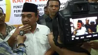 Ketua Umum PWI Margiono usai undian nomor urut Pilkada Tulungagung, Jawa Timur (Liputan6.com/Zainul Arifin)