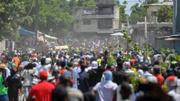 Sementara itu sebuah kelompok aktivis hak asasi manusia (HAM) mendesak komunitas dunia internasional untuk segera turun tangan dan ikut mengakhiri kekerasan yang dilakukan oleh geng-geng kriminal di Haiti. (Richard PIERRIN/AFP)