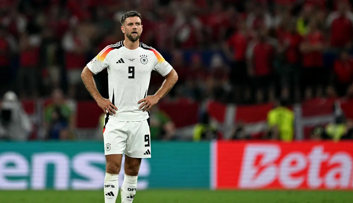 Niclas Fullkrug mulai bermain untuk Borussia Dortmund pada 2023. Namun, Fullkrug tak masuk dalam skema pelatih Dortmund Nuri Sahin pada musim ini. Pemain asal Jerman itu akhirnya dijual ke klub Premier League West Ham. West Ham mengeluarkan 27 juta euro untuk mendapatkan striker 31 tahun tersebut. (OZAN KOSE / AFP)