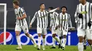 Pemain Juventus Cristiano Ronaldo (kedua kiri) melakukan selebrasi usai mencetak gol ke gawang Ferencvaros pada pertandingan Grup G Liga Champions di Allianz Stadium, Turin, Italia, Selasa (24/11/2020). Juventus melaju ke 16 besar Liga Champions usai menekuk Ferencvaros 2-1. (Marco Alpozzi/LaPresse