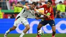 Hingga akhir babak kedua, skor imbang 0-0. Pertandingan antara Spanyol dan Jerman berlanjut ke babak tambahan. (Fabrice COFFRINI/AFP)