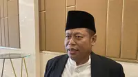 Wakil Ketua MUI Marsudi Syuhud menyatakan bahwa pihaknya menghentikan kerja sama dengan MUI terkait penyaluran beras ke pesantren. Keputusan ini menyusul kasus hukum yang menjerat ACT. (Liputan6.com/Muhammad Radityo Priyasmoro)