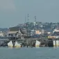 Sebuah dermaga di Senggarang dengan latar belakang Kota Tanjungpinang. (Liputan6.com/ Syahrul Rahmat)