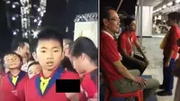Bocah yang mengacungkan jari tengah saat peringatan HUT ke-52 Singapura. (Asia One)
