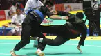 Pesilat Aji Bangkit Pamungkas saat bertarung melawan Duy Tuyen Nguyen dari Vietnam pada semifinal kelas I putra 85kg-90kg Asian Games 2018 di Padepokan Pencak Silat, TMII, Jakarta (26/8). Aji berhasil menang dengan skor 5-0. (Merdeka.com/Arie Basuki)