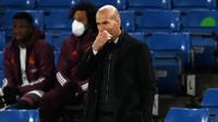 Zinedine Zidane. Manajer tim Real madrid, Zinedine Zidane tidak pernah menang saat menghadapi Thomas Tuchel dengan 3 tim berbeda, Borussia Dortmund, PSG dan Chelsea dengan rincian 4 kali imbang dan 2 kali kalah. (AFP/Glyn Kirk)