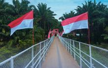 Brimob Sumut Selesaikan Perbaikan Jembatan Gantung di Paluta, Permudah Akses Warga