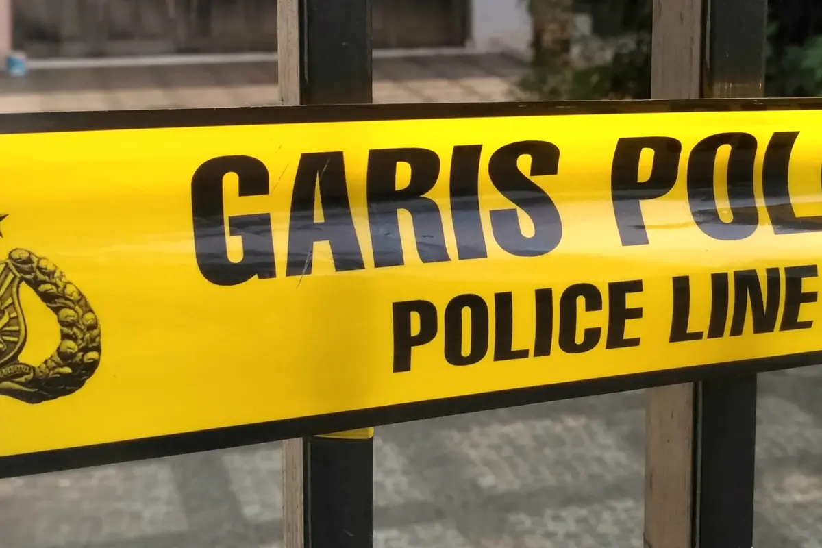 Ilustrasi garis polisi pembunuhan (Merdeka.com/ Ronald)