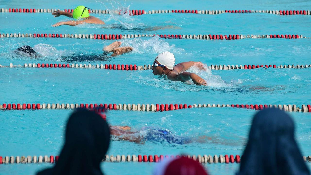 Semangat Murid SD Bertanding Renang dalam Olimpiade Olahraga Siswa Nasional