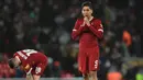 Ekspresi Penyerang Liverpool Roberto Firmino (kanan) usai pertandingan melawan West Bromwich Albion pada putaran keempat Piala FA di stadion Anfield, Inggris (27/1). Liverpool takluk dari West Bromwich Albion 3-2. (AFP Photo/Paul Ellis)