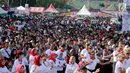 Peserta mengikuti kegiatan Millenial Road Safety Festival Gorontalo, Minggu (10/2). Kegiatan dilaksanakan sebagai upaya memberikan pengetahuan kalangan millenial di Gorontalo untuk tertib berlalulintas. (Liputan6.com/Rahmad Arfandi Ibrahim)