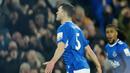 Pemain Everton, Michael Keane, melakukan selebrasi setelah mencetak gol ke gawang Tottenham Hotspur pada laga Liga Inggris di Stadion Goodison Park, Selasa (4/4/2023). (AP Photo/Jon Super)