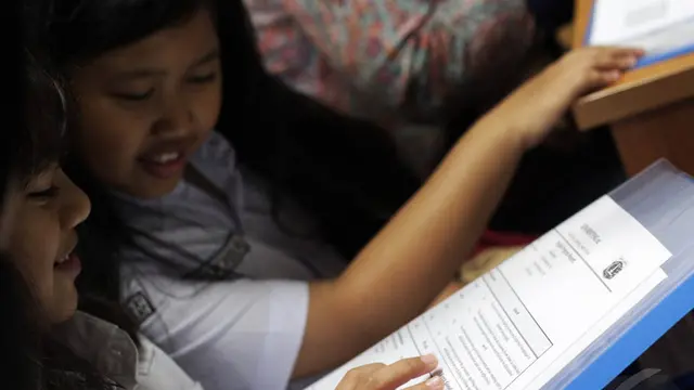 Hari Pertama Masuk Sekolah, SDN Menteng 01 Baru Bagi Rapor