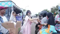 Keseruan Carol De Keliling Kota Batu Bagikan Ratusan Takjil ke Warga