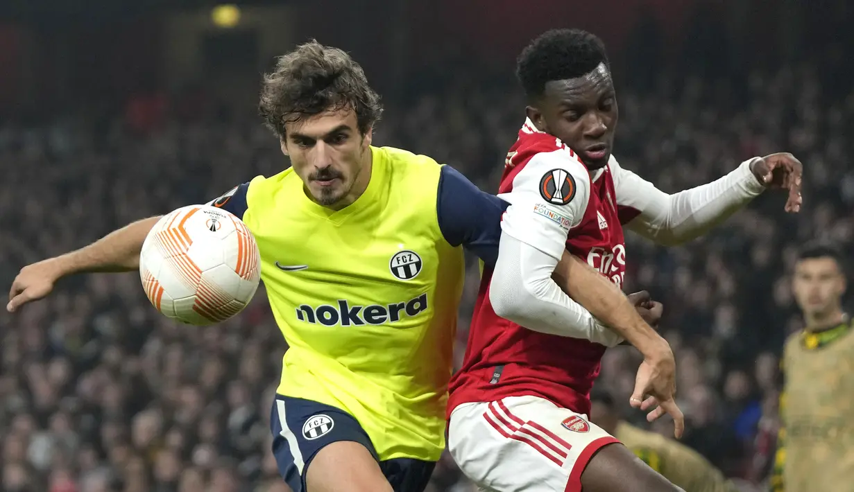 <p>Kemenangan tersebut membuat The Gunners sukses mengunci status juara grup dan melaju ke babak 16 besar tanpa melewati jalur play-off. Mereka berhasil meraih 15 poin atau unggul dua angka dari PSV Eindhoven.&nbsp;(AP/Frank Augstein)</p>