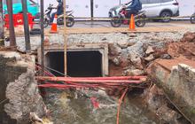 Update Perbaikan Jalan Lenteng Agung Amblas, Derasnya Aliran Air dari Danau UI ke Ciliwung Terlihat Jelas