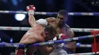 Tinju : Anthony Joshua Menang KO atas Pulev