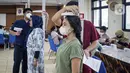 “Hasil dari beberapa masukan, seminar, kemudian kajian, diskusi dan evaluasi terkait dengan Pemilu 2019, rata-rata teman-teman yang mengalami meninggal dunia, sakit dan sebagainya itu karena ada komorbid. Hal ini setidaknya kami harapkan tidak terjadi lagi,” kata Parsadaan. (Liputan6.com/Faizal Fanani)