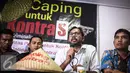 Hariz Azhar memberikan keterangan kepada awak media di Jakarta, Selasa (9/8). Dukungan yang bertemakan "Caping untuk Kontras" untuk menghentikan tindakan kriminalisasi terhadap pejuang HAM dan para pejuang disektor agraria. (Liputan6.com/Faizal Fanani)