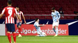 Kemenangan di depan mata Atletico Madrid buyar menyusul gol telat Celta Vigo di menit akhir babak kedua melalui Facundo Ferreyra. (AP Photo/Jose Breton)