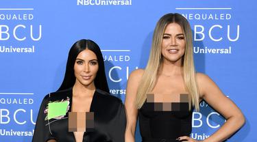 [Bintang] Kim Kardashian dan Khloe Kardashian