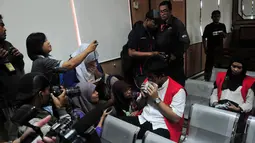 Ahmad Imam Al Hafitd menjawab pertanyaan para awak media sebelum persidangan dimulai, Jakarta, Selasa (28/10/2014). (Liputan6.com/Johan Tallo)