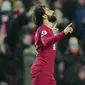 Pemain Liverpool, Mohamed Salah, melakukan selebrasi setelah mencetak gol ke gawang Everton pada laga Liga Inggris di Stadion Anfield, Selasa (14/2/2023). (AP Photo/Jon Super)