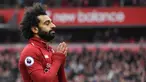 Gelandang Liverpool Mohamed Salah berselebrasi usai mencetak gol ke gawang Chelsea dalam lanjutan Liga Inggris di Stadion Anfield, Liverpool, Inggris, 14 April 2019. Pamain asal Mesir ini akan membela Liverpool menghadapi Tottenham Hotspur di final Liga Champions 2019. (Photo by Paul ELLIS/AFP)