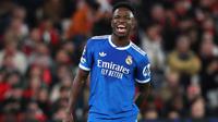 Pemain Real Madrid, Vinicius Junior, bereaksi dalam laga fase awal Liga Champions antara SL Benfica melawan Real Madrid, Rabu (18/2/2026). (AP Photo/Pedro Rocha)