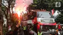 Arakan-arakan Timnas Indonesia U-22 berangkat dari Kemenpora menuju Stadion Utama GBK. (Liputan6.com/Johan Tallo)