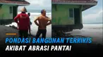 Pasir pantai terkikis oleh permukaan laut yang semakin tinggi dan ombak yang menerjang.