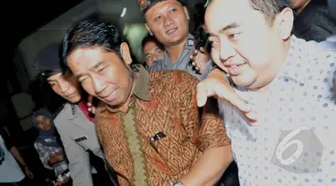 Wakil ketua DPRD DKI Jakarta,  H Abraham Lunggana atau H Lulung usai menjalani pemeriksaan di Bareskrim Mabes Polri, Kamis (30/04/2015). H Lulung diperiksa sebagai saksi kasus dugaan tindak pidana korupsi pengadaan UPS. (Liputan6.com/Andrian M Tunay)