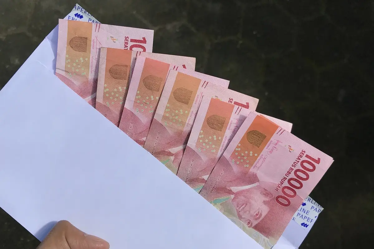 Ilustrasi uang rupiah, THR