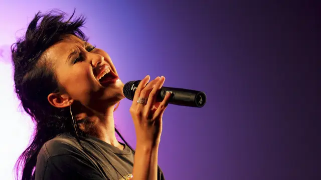 Coco Lee pada 2005. (AP/Kin Cheung, File)