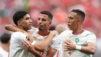 Azzedine Ounahi mencetak gol kemenangan Maroko saat menghadapi Kanada di babak 16 besar Piala Dunia 2026. Selebrasi bersama Achraf Hakimi dan Soufiane Rahimi menjadi momen yang membawa Singa Atlas selangkah lebih dekat ke perempat final. (Kevin C. Cox/Getty Images/AFP)