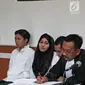 Ekspresi terdakwa kasus dugaan penipuan perjalanan umrah First Travel, Anniesa Hasibuan saat menjalani sidang lanjutan di PN Kota Depok, Jawa Barat, Senin (9/4). (Liputan6.com/Herman Zakharia)