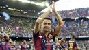 Hanya semusim mengemban tugas sebagai seorang kapten, Xavi dilepas Barcelona dengan gratis ke klub asal Qatar, Al Sadd. (Foto: AFP/Lluis Gene)