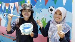 Kegiatan tersebut dalam rangka memeriahkan sekaligus mengikuti lomba Bucin Piala Dunia 2022 yang diselenggarakan Grup Media PT Surya Citra Media Tbk (SCM) sebagai pemegang lisensi eksklusif Piala Dunia 2022. (Bola.com/M Iqbal Ichsan)