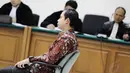 Terdakwa kasus suap pengurusan gugatan sengketa pilkada di Mahkamah Konstitusi, Tubagus Chaeri Wardana dituntut hukuman 10 tahun penjara serta denda sebesar Rp 250 juta, oleh Jaksa Penuntut Umum. Jakarta, Senin, (26/5/14) (Liputan6.com/Fiazal Fanani)