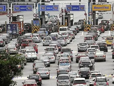 Malaysia juga mengalami masalah kemacetan saat mudik lebaran. (Source:merdeka.com)