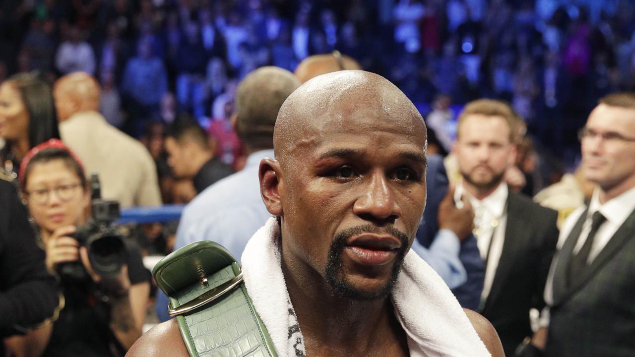 Floyd Mayweather, Conor McGregor, Tinju Dunia