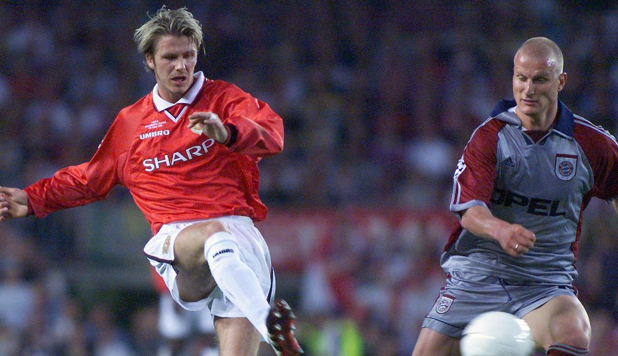 David Beckham. Bintang Manchester United ini meraih treble winners bersama Setan Merah pada musim 1998/1999. Ia pun dinominasikan sebagai peraih Ballon d'Or edisi 1999. Nyatanya, gelar diraih Rivaldo yang hanya meraih satu gelar, yaitu LaLiga 1998/1999 bersama Barcelona. (AFP/Eric Cabanis)