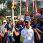 Salah satu Pembawa obor Asian Games 2018, Mohamad Yusuf, yang berprofesi sebagai penjual es krim (Inasgoc)