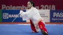 Atlet wushu Indonesia, Lindswell Kwok, saat beraksi pada Asian Games di JIExpo, Jakarta, Senin, (20/8/2018). (Bola.com/Vitalis Yogi Trisna)