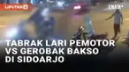 Tabrakan melibatkan seorang pemotor dan pedagang bakso terjadi di Sidoarjo, Jawa Timur pada Selasa (24/9/2024) malam. Pemotor tiba-tiba menabrak pedagang bakso dan gerobaknya dari belakang saat sama-sama melintas di daerah Jabaran, Balongbendo. Pemot...